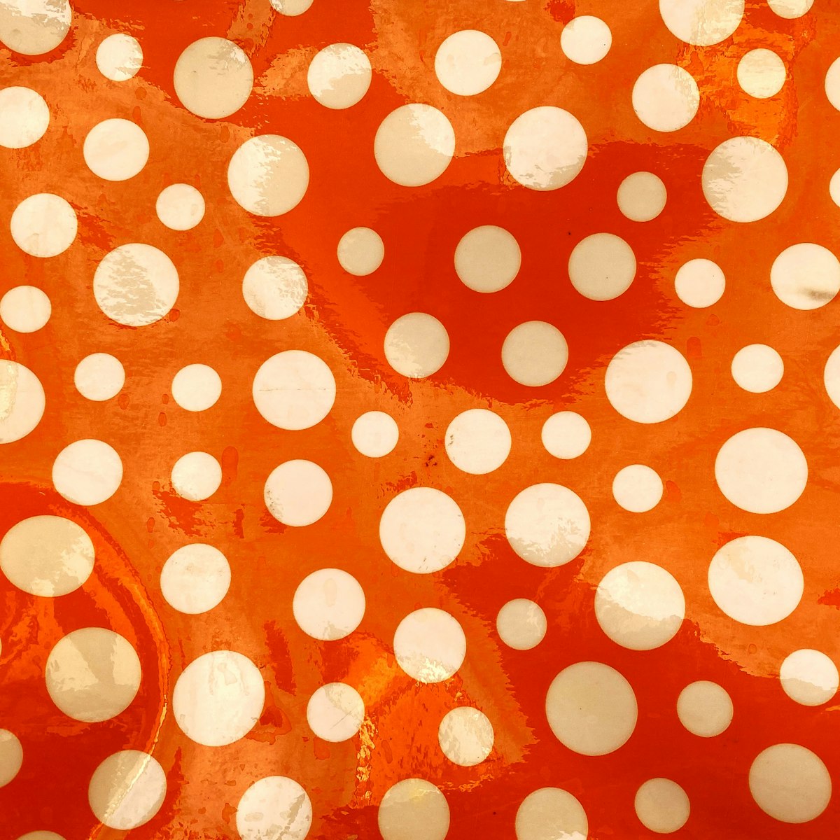 Red and white polka dot spotted textile